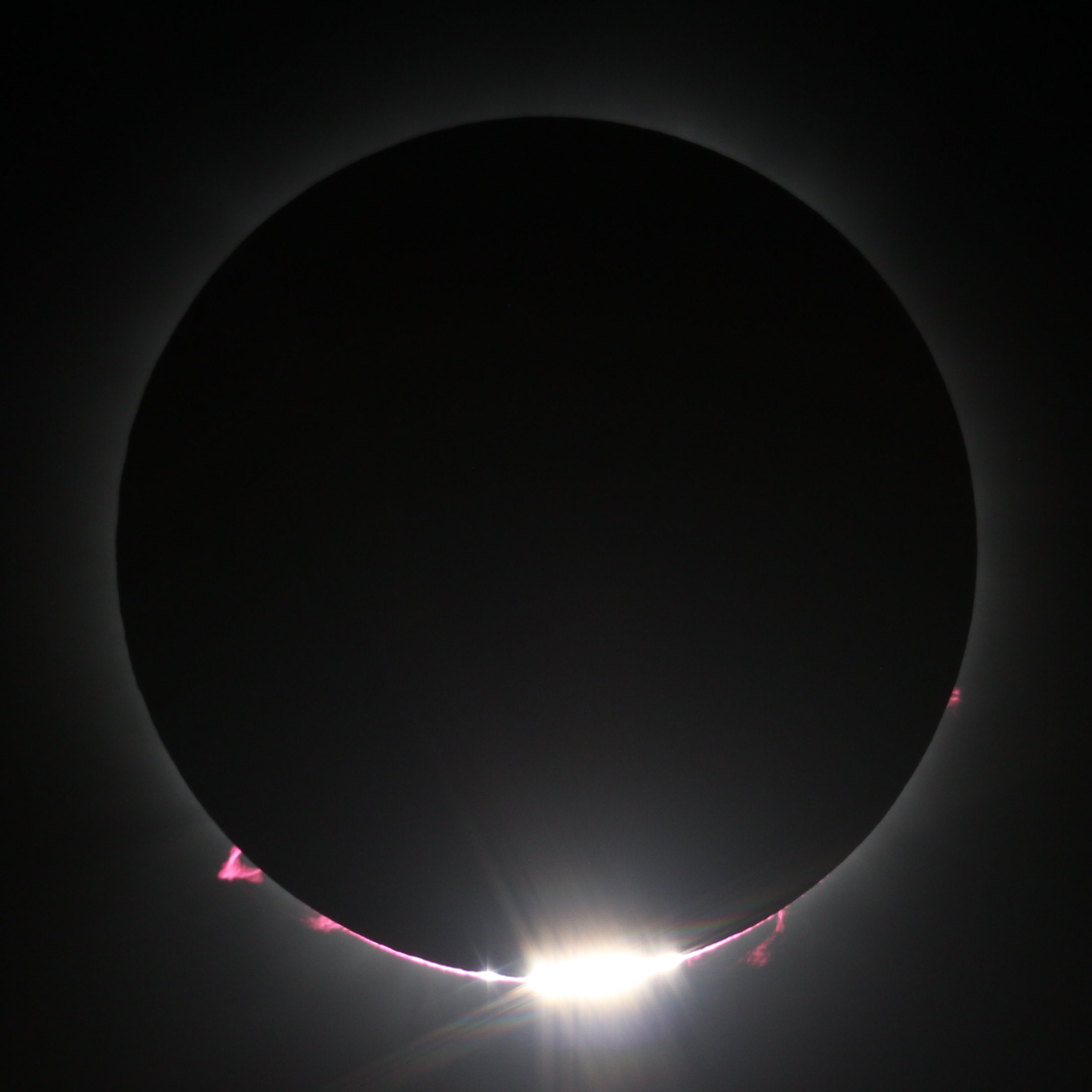 Coronal Mass Ejections and Bailey's Beads visible during totality.